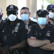 NYPD Police officers listen as Police Benevolent Association of the City of New York President Pat Lynch and representatives from other NYPD and law enforcement unions holds a news conference on June 9, 2020 to address the “current anti-law enforcement environment.”